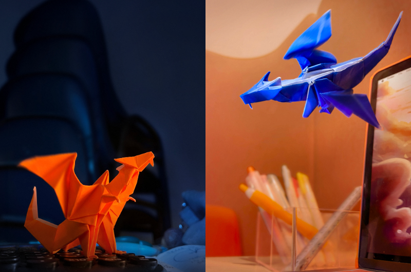 Orange and blue origami resin dragons.