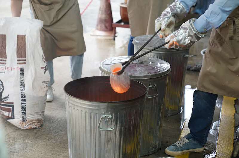 Image of clay firing over embers