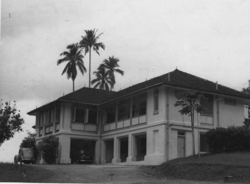 Black and white image of an old colonial bungalow in Adam Park