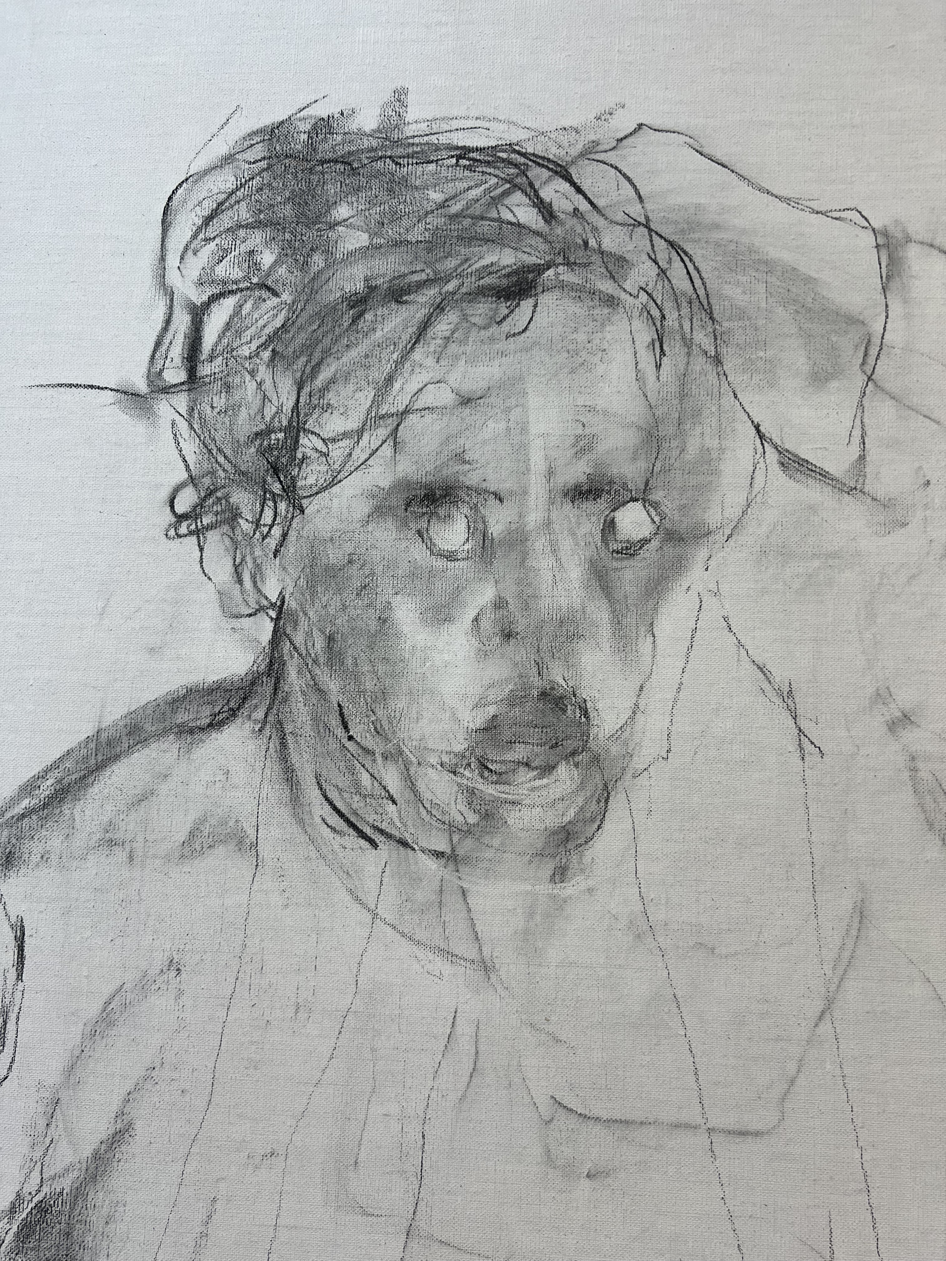 Pencil strokes outlining an older person with a sullen expression