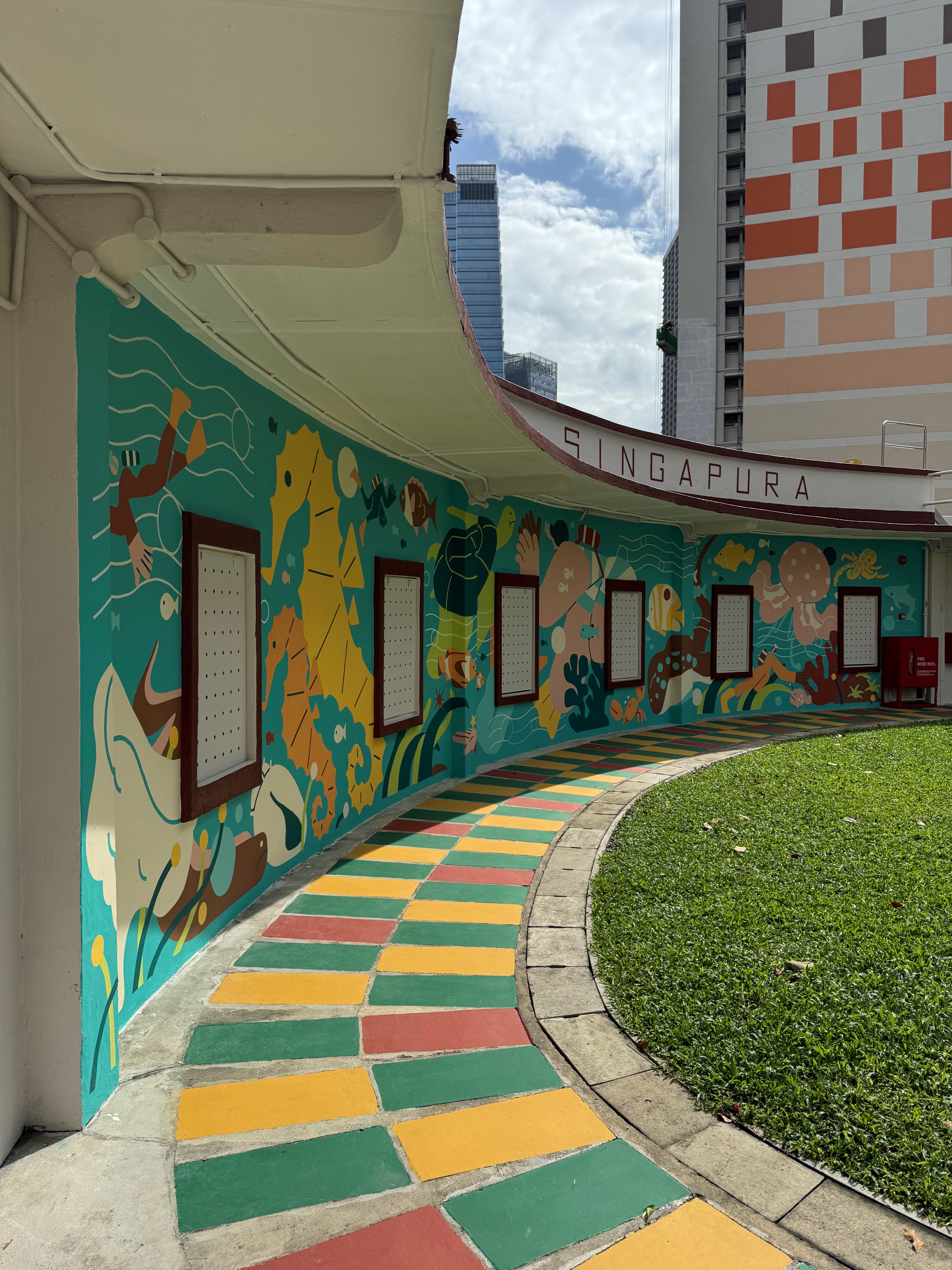 Wall with colorful mural and floor