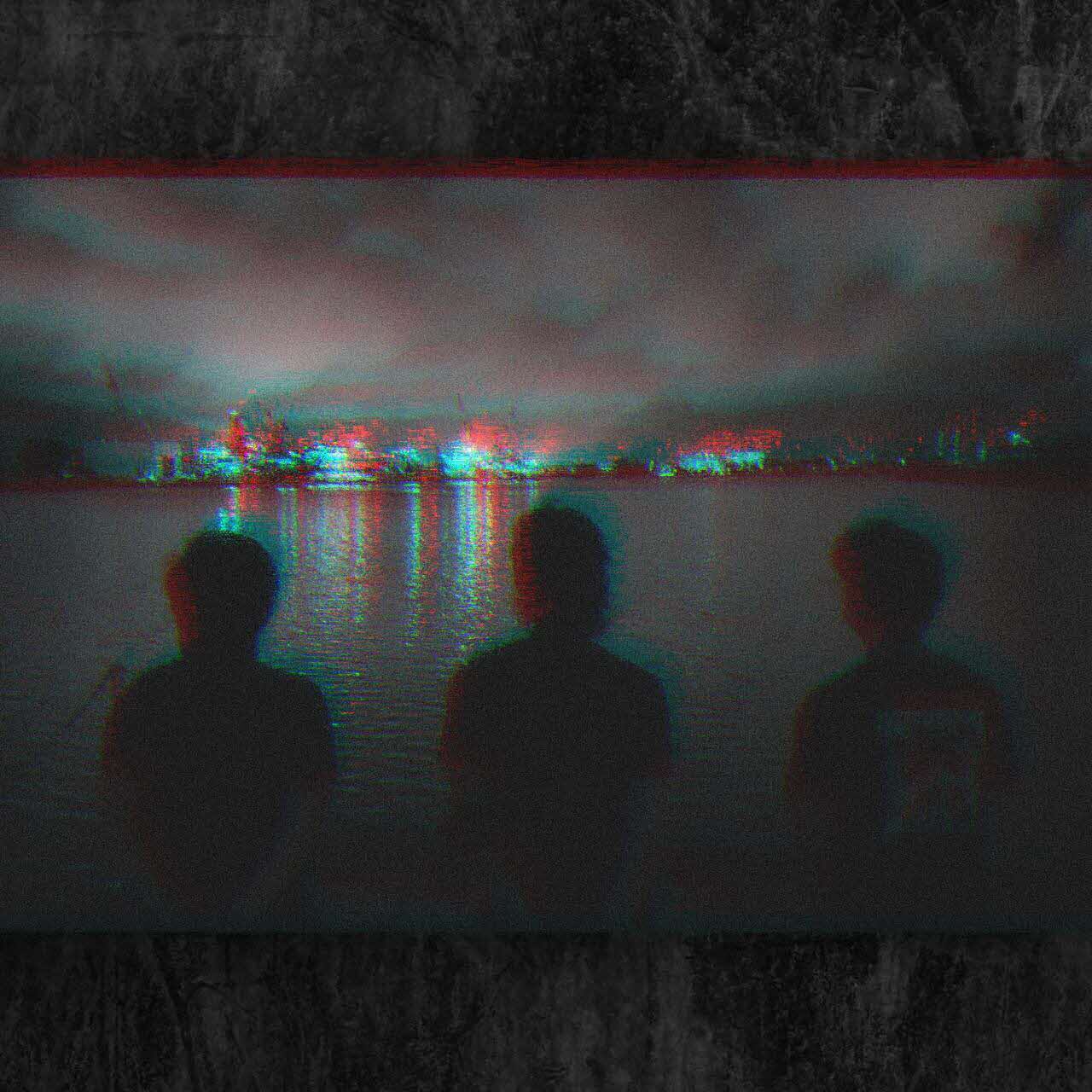 Black and white image of the backview of 3 men looking out over a body of water